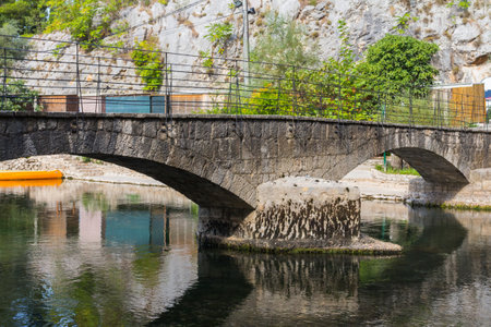 View of the stone arch bridge in the town of Blagaj. Bosnia and Herzegovinaの写真素材