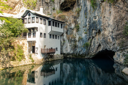 Beautiful view of the Dervish House under the rock in Blagaj. Bosnia and Herzegovinaのeditorial素材