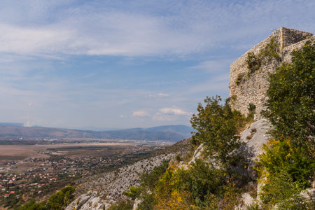 View from the top of the mountain on the town of Blagaj on a sunny day. Bosnia and Herzegovinaの写真素材