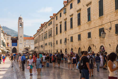 The central street of the Old Town of Dubrovnik is filled with tourists on a sunny day. Croatia. September 22, 2018のeditorial素材