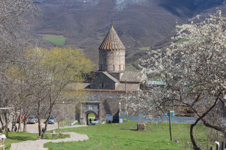 View of the Tatev Monastery among the flowering trees in spring. Armeniaの写真素材