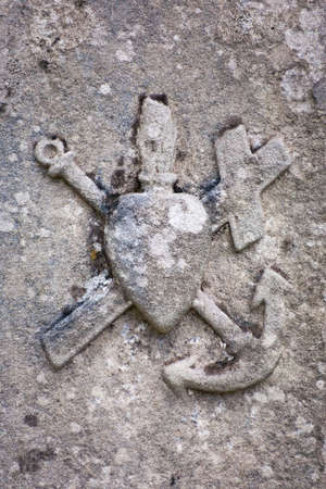 The very old christian symbol - Heart with Cross and Anchor. Every object has its unique meaning. Heart means love, cross means faith and anchor - hope.の写真素材