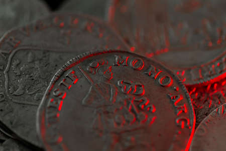 trove of ancient medieval coins silver backgroundの写真素材