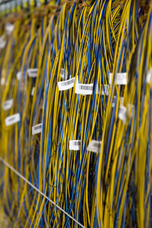 Bunch of colorful electrical wires on the lineの写真素材