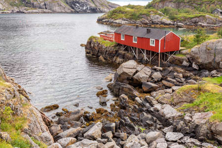 Scenic village with mountains at bright summer day in Lofoten, Norwayの写真素材