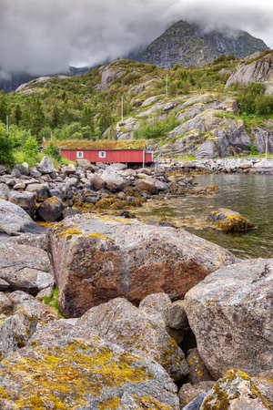 Red wooden house called rorbu at the Lofoten archipelago, North Norwayの写真素材