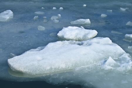 Large block of ice frozen on lake 