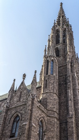 Incredible architecture of a tall steeple church の写真素材