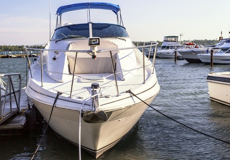 Beautiful white cabin cruiser bow view の写真素材