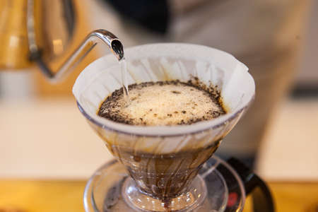 moment of coffee brewingの写真素材