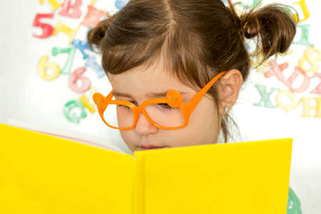 Young girl is ready to go back to school.の写真素材