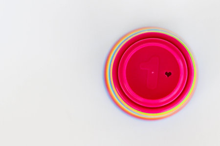 Colorful stackable cups used for toddler education and fine motor skills.の写真素材