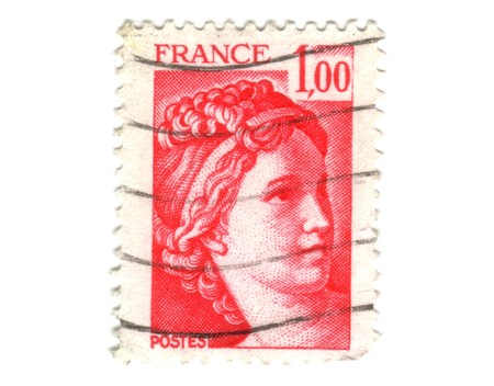Old red french stamp with woman head の写真素材