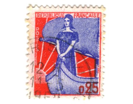 Old french stamp with lady on boatの写真素材