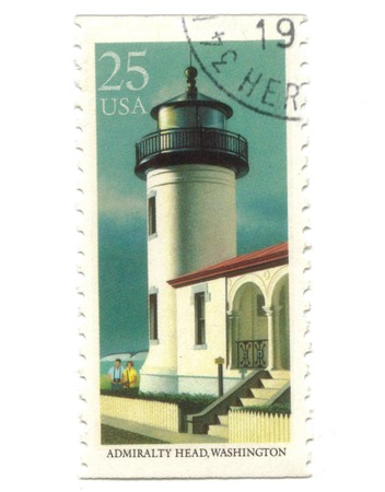 Old postage stamp from USA with Lighthouse - Admiralty Head, Washingtonの写真素材