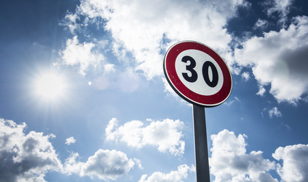 speed limit sign sunlitの写真素材