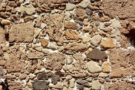 Ancient stone wall.Details of an ancient Spanish fortressの写真素材