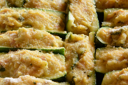 Zucchini stuffed. Typical dish of Italian cuisine, freshly prepared and ready for bakingの写真素材