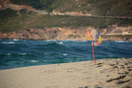 fish net used to catch small fish in shallow waterの写真素材