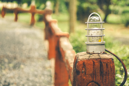 A lamp with pathway and fencesの写真素材