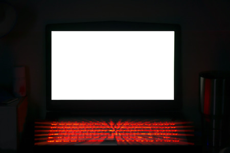 White monitor laptop for text and glowing red keyboard for hacking ,gaming conceptの写真素材