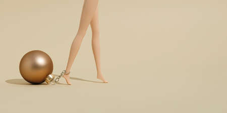 Christmas bauble, ball chain around leg. Minimal New Year concept. Creative idea background.の写真素材