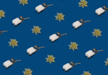 Christams pattern made with winter and New Year objects on blue background. Minimal Christmas concept.の写真素材