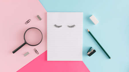 Back to school 
arrangement made of school things on the pink and blue background. School and office inspiration. Minimal flat lay concept with copy space.の写真素材