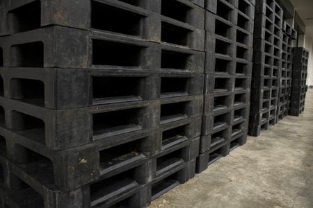 Black Plastic Pallet back groundの写真素材