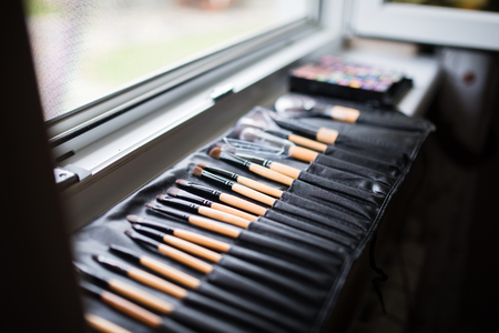 makeup brushes, closeup. Makeup artist working outdoor eventsの写真素材