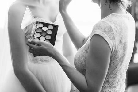 Wedding makeup closeup. Backstage makeup artist working with makeup.の写真素材
