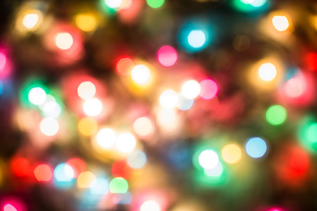 Multicolored defocused bokeh blurry lights, Christmas lights, festive background