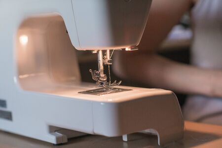 Sewing machine on tableの写真素材