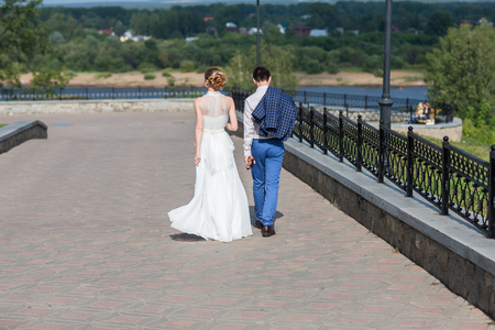 Happy bride and groom celebrating wedding day.の写真素材