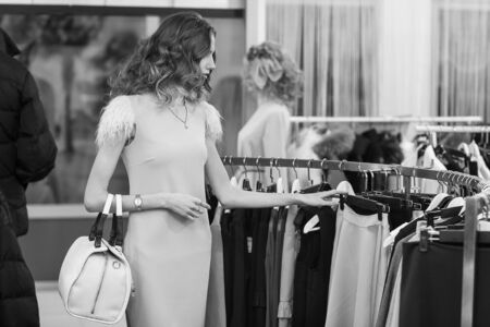 woman shopping in clothing storeの写真素材