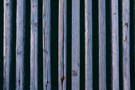 Natural brown wooden wall made with desks background