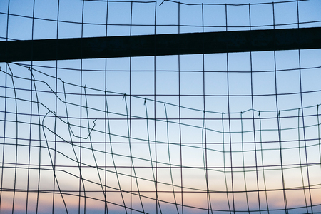 metal grid at sunsetの写真素材