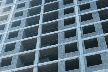 Multi storey under construction building close-up outdoor.の写真素材