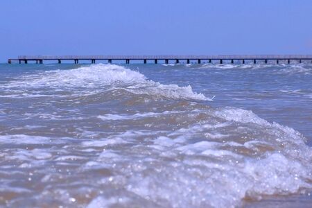 Beautiful blue sea ocean background. Natural waves with foam in windy weather. Nature seascape with...