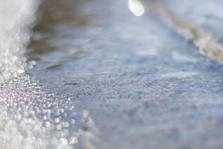 raindrops on the surface of a puddle, close-upの写真素材