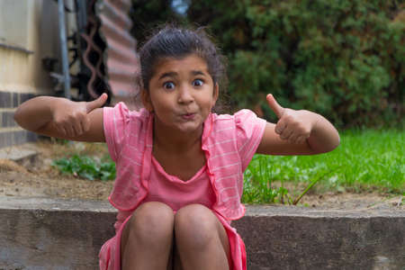 Small child enthusiastic gesticulatingの写真素材