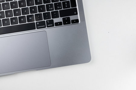 Laptop computer with blank screen on white background. Top views.