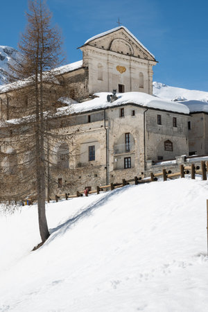 The Church of St. John the Baptist in the Swiss Alps in winterの写真素材