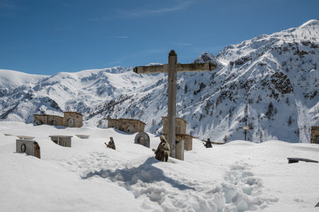 Cross in the snow in the mountains of the Caucasus, Russia.の写真素材