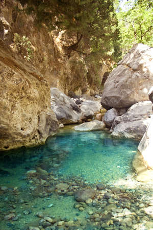 Beautiful mountain river with clear blue water の写真素材