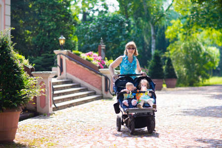 Woman with a double stroller