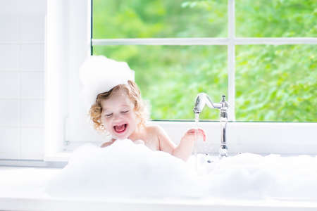 Child Taking Bath Little Baby In A Bath Tub Washing Hair With