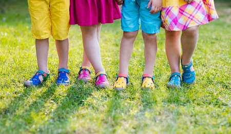 Footwear for children. Group of preschool kids wearing colorful leather shoes. Sandal summer shoe...