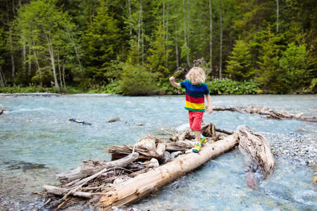 Little boy on scenic hike trail. Outdoor fun. Active recreation with children.の写真素材