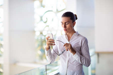 Businesswoman at work. Female executive lawyer working in office. Business and career concept. Young...